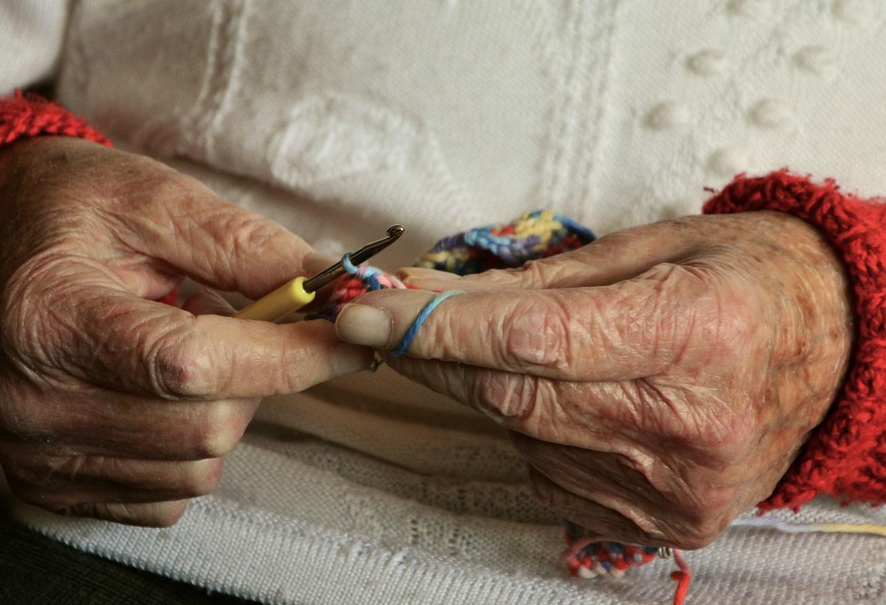 Hands knitting healthcare senrio