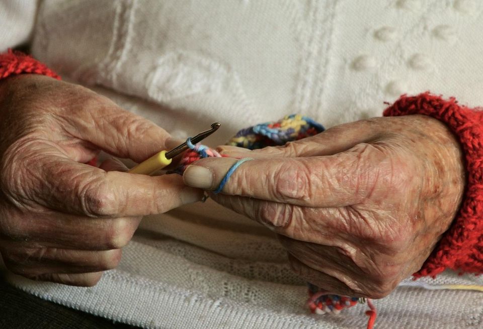 Hands knitting healthcare senrio