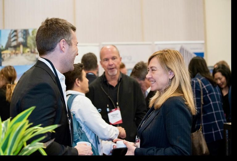 Attendees network at Bisnow's State of Los Angeles Multifamily event at the JW Marriott LA Live in downtown Los Angeles