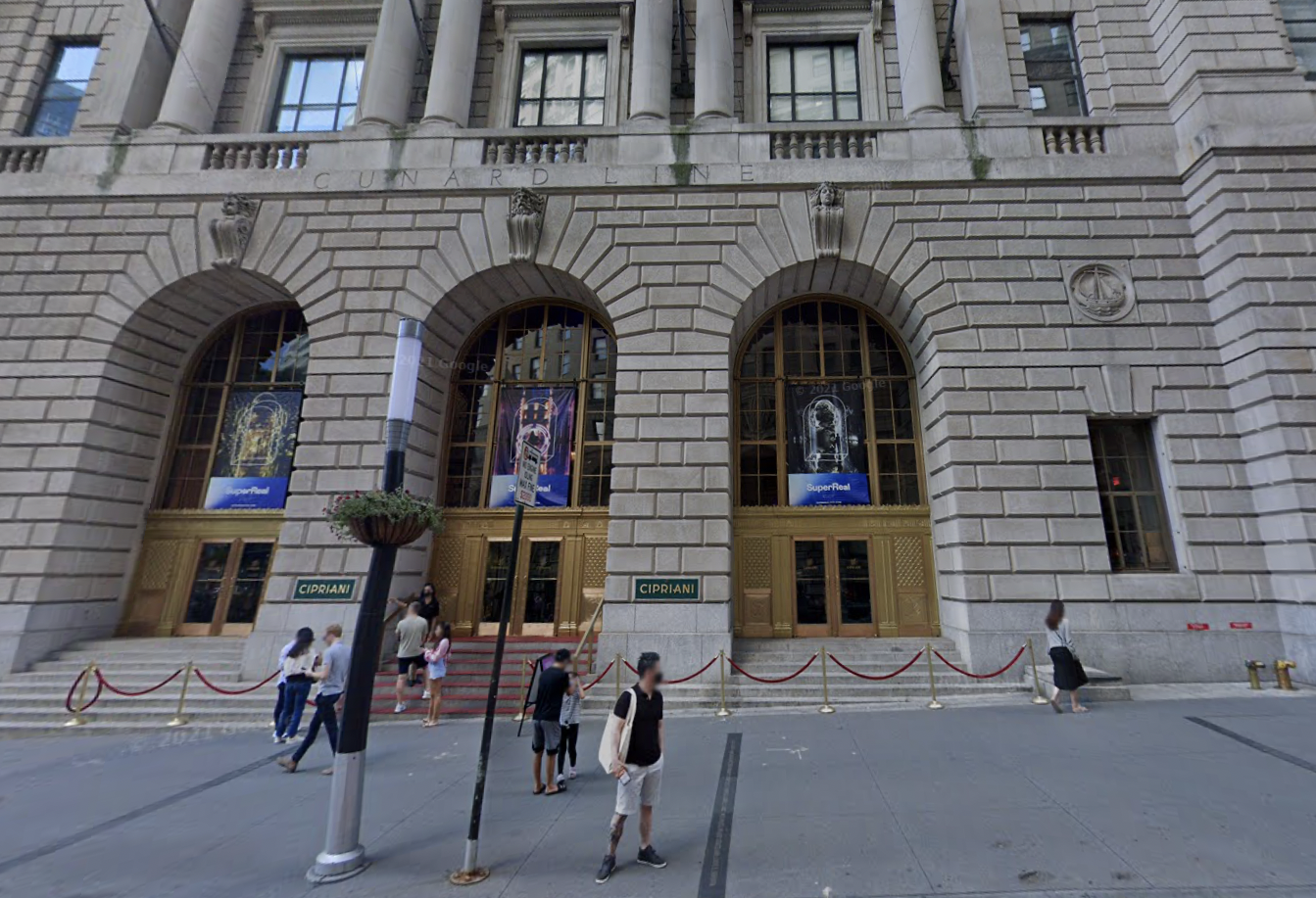 People stand outside Cipriani's 25 Broadway location in August 2021.