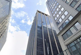 111 Wall St., which InterVest Capital Partners and Metro Loft are planning on converting into a 30-story luxury apartment building.