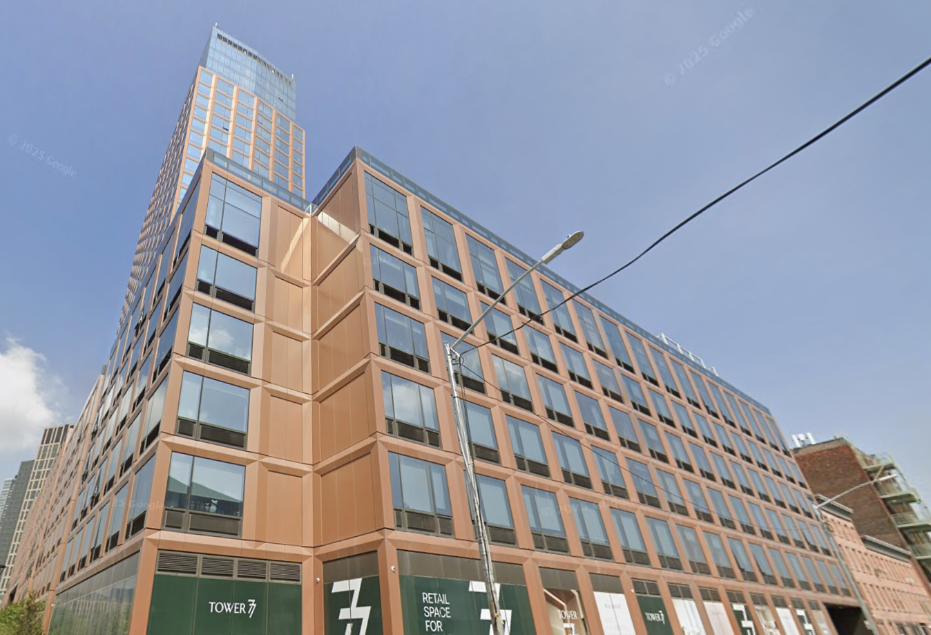 Clipper Equity's Tower 77, a 766-unit multifamily complex at 77 Commercial St. in Greenpoint.