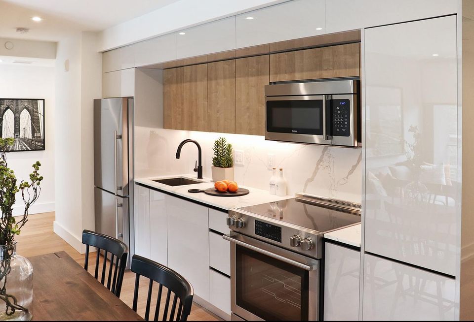 A kitchen at the Piazza in Philadelphia, all finishes and materials provided by Mega Supply Pro