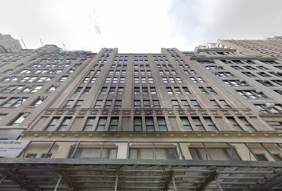 256 W. 38th St., one of two buildings sold this week by a joint venture between asset management firm Investcorp and real estate company Brickman for a cumulative loss of $116M.