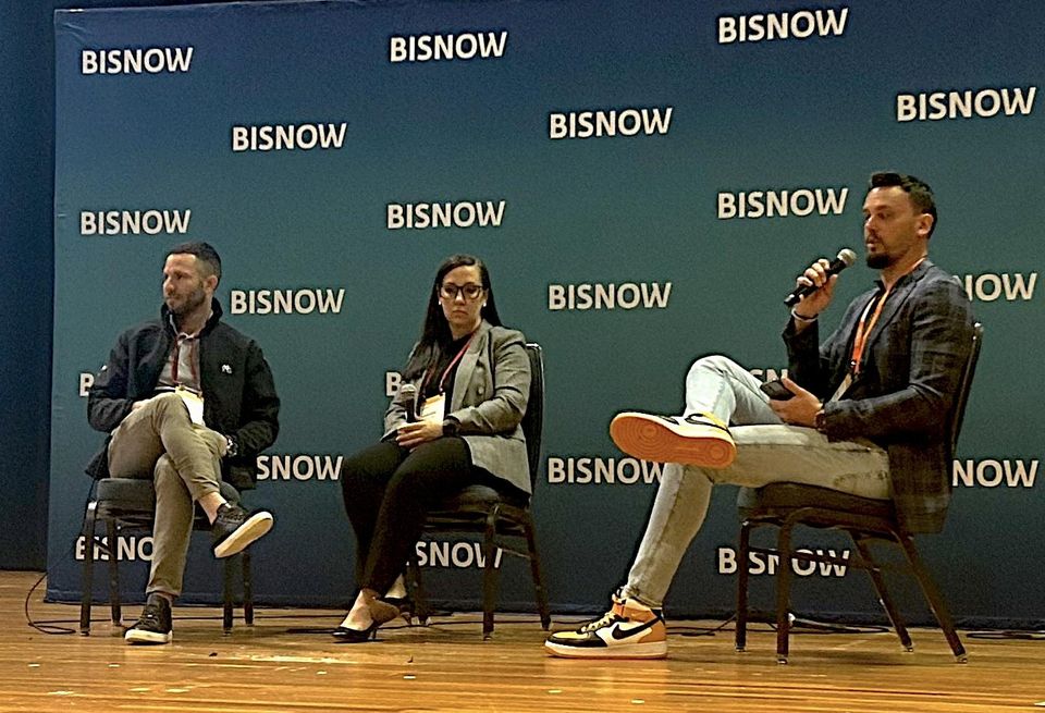 Property Markets Group’s Ryan Shear, MKDA’s Amanda Hertzler and Bisnow’s Jordan Hinsch at Bisnow’s Future of Wynwood, Design District and Midtown event on Jan. 30, 2024.