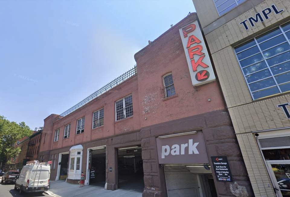 A two-story parking garage at in Greenwich Village, located at 160 West 10th St., where the NYC DOB issued a partial order to vacate after insepectors found damage to supporting steel girders and wooden joists, sheet metal handing from the ceiling and risk of ceiling collapse in several places among other violations.