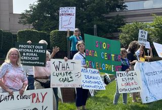Northern Virginia data center opponents protesting outside of Bisnow's DICE East event in Tysons in 2022.
