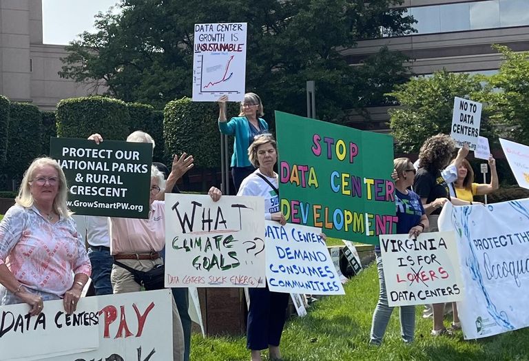 Northern Virginia data center opponents protesting outside of Bisnow's DICE East event in Tysons in 2022.