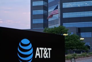 AT&T sign in front of an office building.
