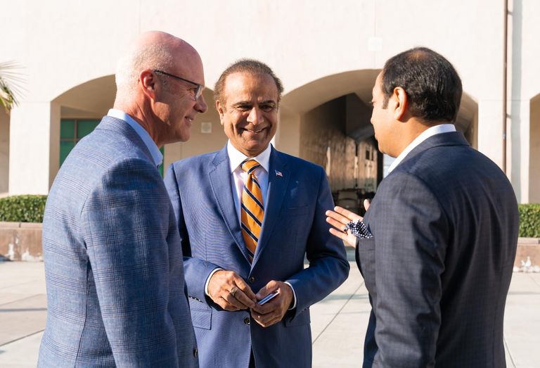 Visit Anaheim President and CEO Jay Burress with Anaheim Mayor Harry Sidhu and Prospera Hotels President and CEO Ajesh Patel 