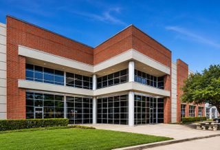 The industrial building at 1645 Wallace Drive in Carrollton.