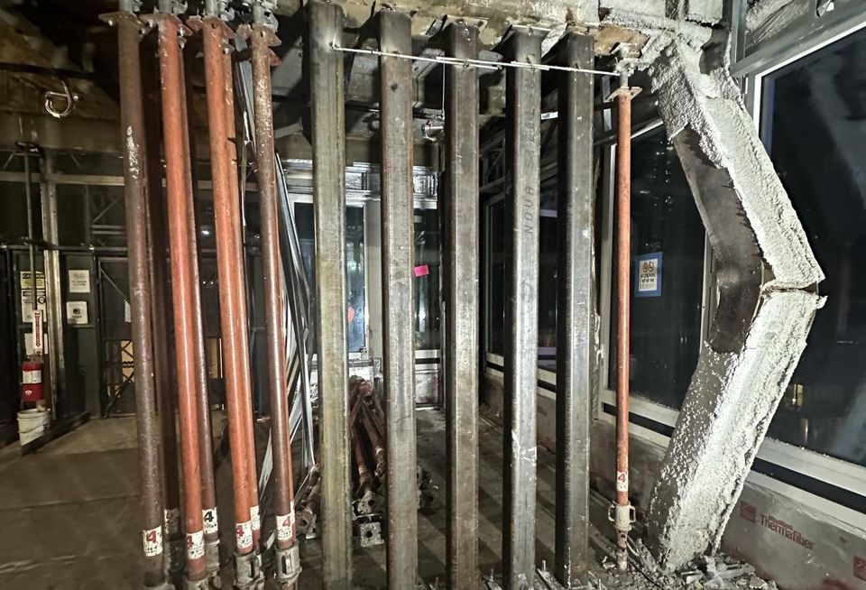 Building inspectors detected multiple beams and columns in the 42nd Street conversion project that buckled under the weight of an 11-story addition.