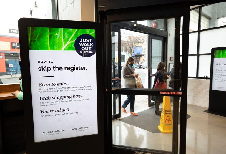 Signage at the Glover Park Whole Foods instructing customers on how to use Amazon's Just Walk Out technology.