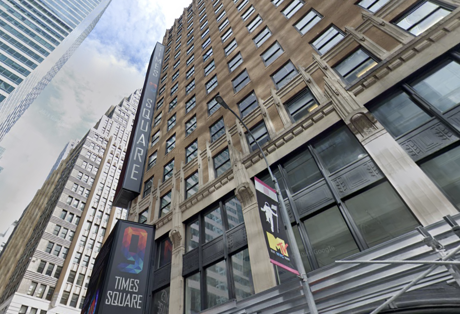 New York City REIT's 9 Times Square, one of the four properties for which the REIT has been in breach of covenants. 