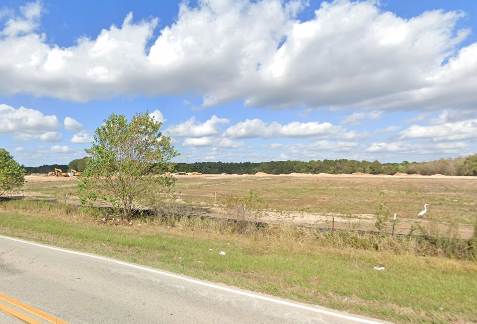 A view of an empty field on Boudreaux Road in Tomball, Texas