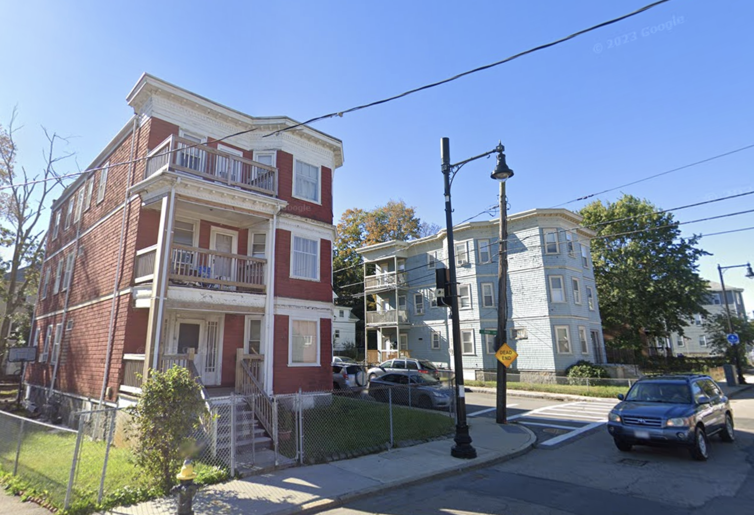Three-family properties on River Street in Hyde Park. 