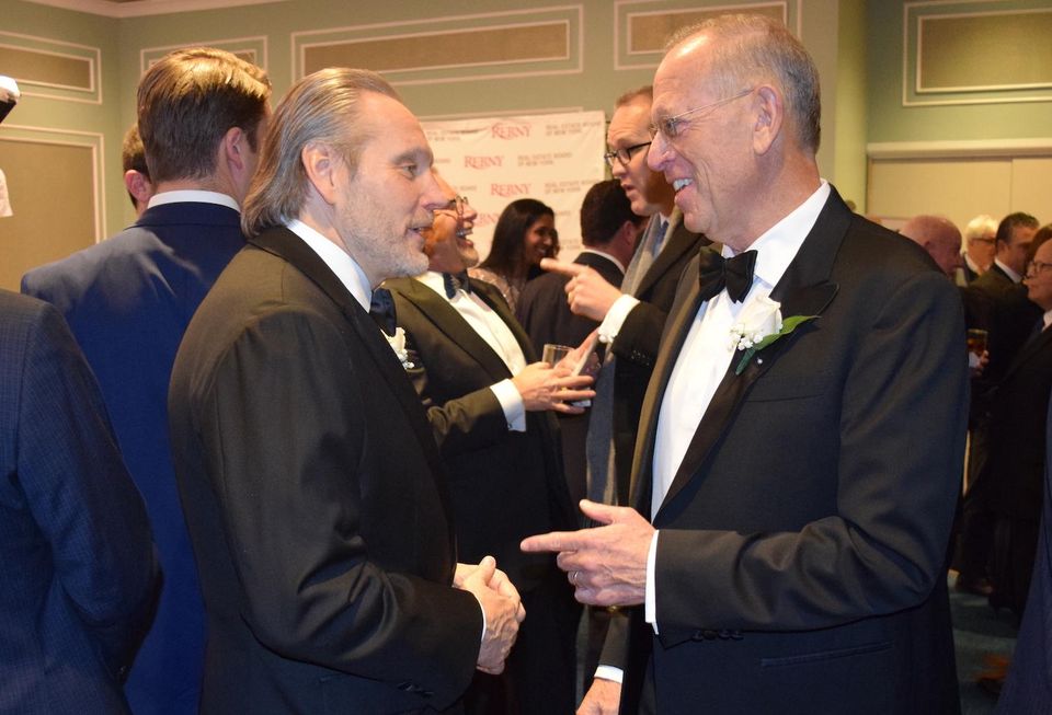 JLL Chairman of Investment Sales Bob Knakal and Douglaston Development Chairman and CEO Jeffrey Levine at the 124th REBNY banquet Jan. 16, 2020