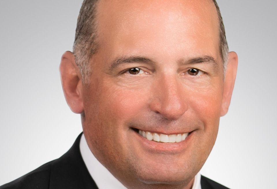 A traditional headshot of Northmarq regional managing director of commercial real estate investment firm Northmarq