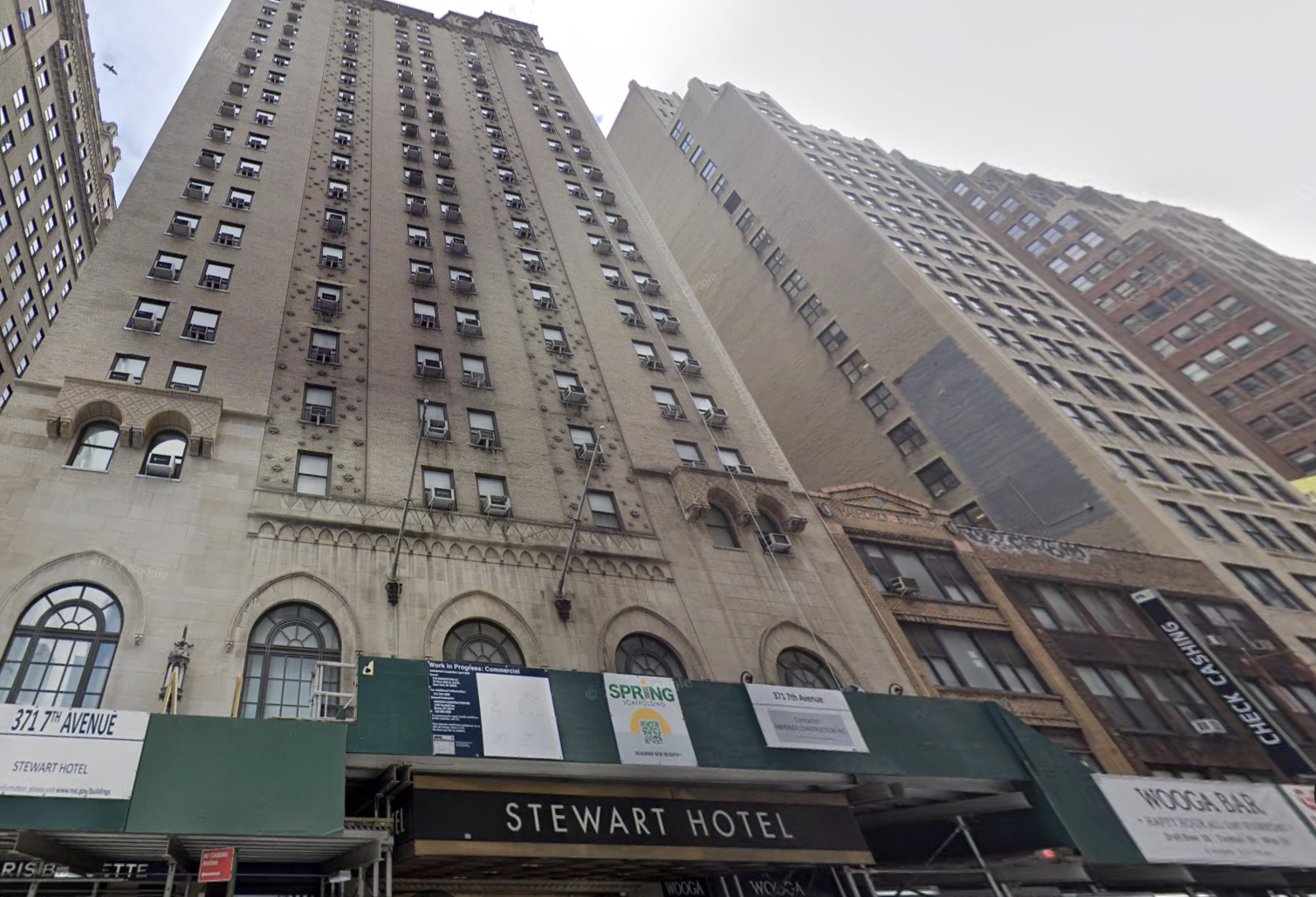 The Stewart Hotel in Manhattan is among the hotels that will cease to operate as an emergency shelter for migrants.