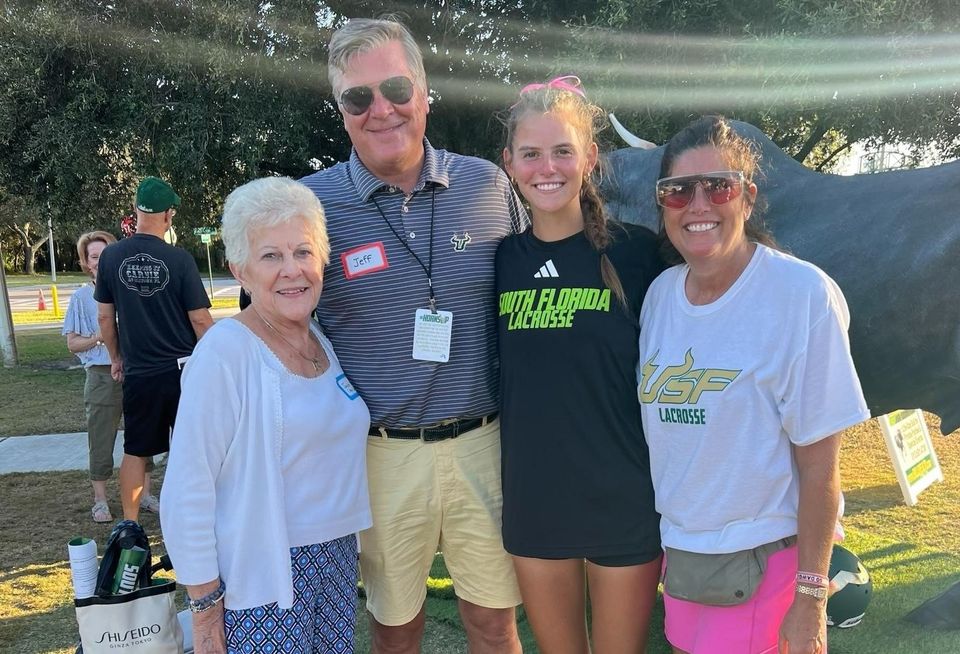 Jeff Uphues with his mother, daughter and wife.