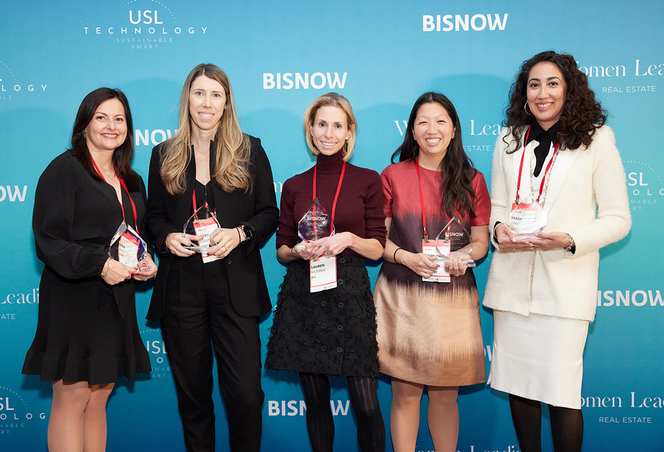 Cit's Ana Rosu, KKR's Kerry Galligan, JLL's Lauren Kaufman, L&L Holding Co.'s Susan Choi Raffo and GreenbergTraurig's Farah Ahmed at with their awards at Bisnow's 2024 New York Power Women event.