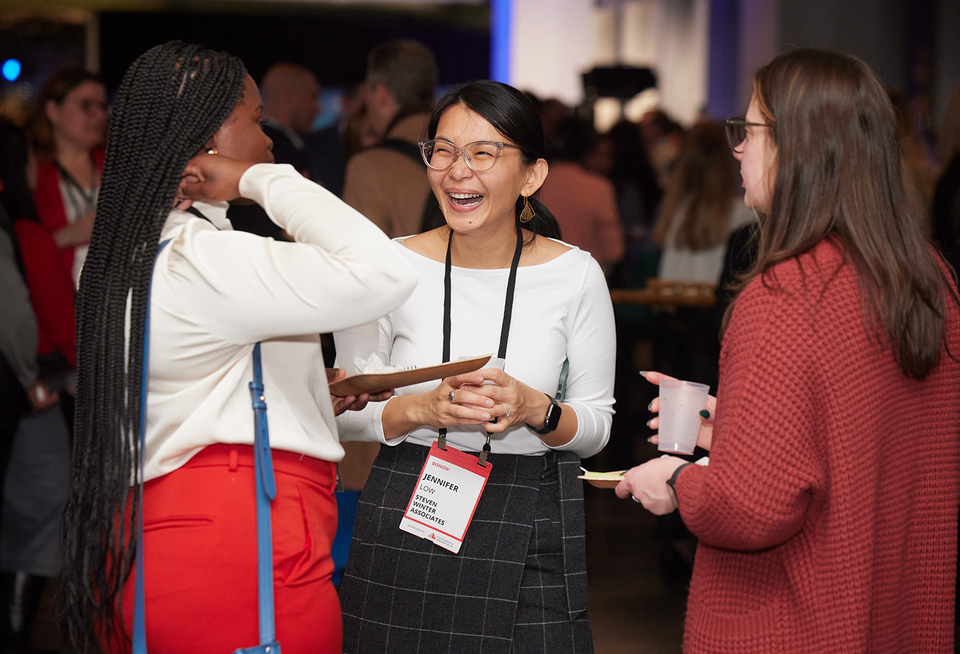 Members of the commercial real estate industry networking at Bisnow's 2024 Power Women event.