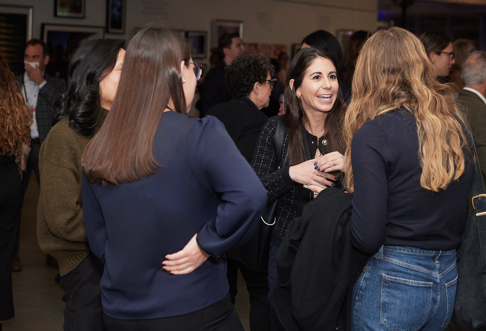 Networking at Bisnow's 2024 Power Women event.