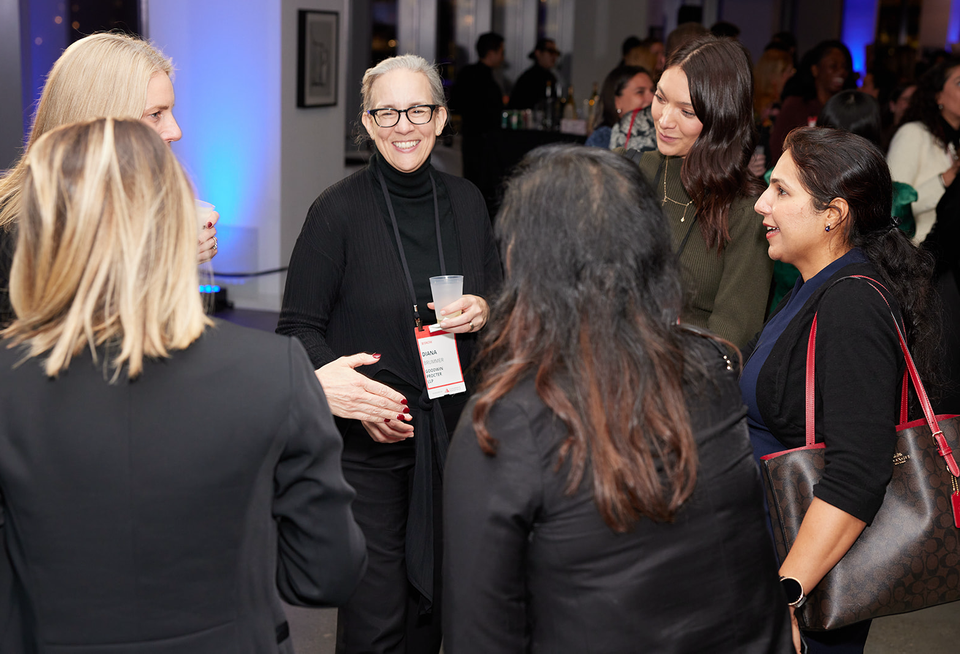 CRE professionals networking at Bisnow's 2024 New York Power Women event.