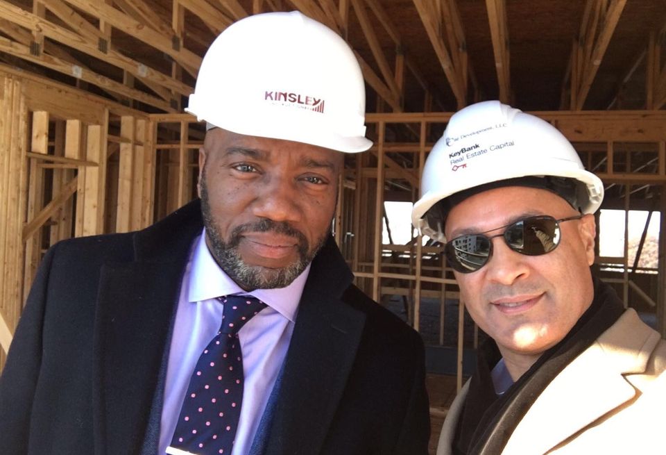 Malik Yoba on site during construction in West Baltimore, with project partner Ian Arias of La Cité development.