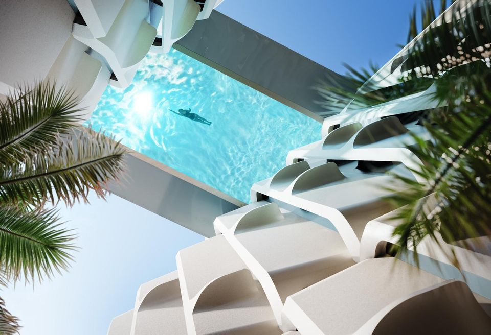 The rooftop swimming pool at The Delmore is suspended between two towers more than 100 feet above the street.
