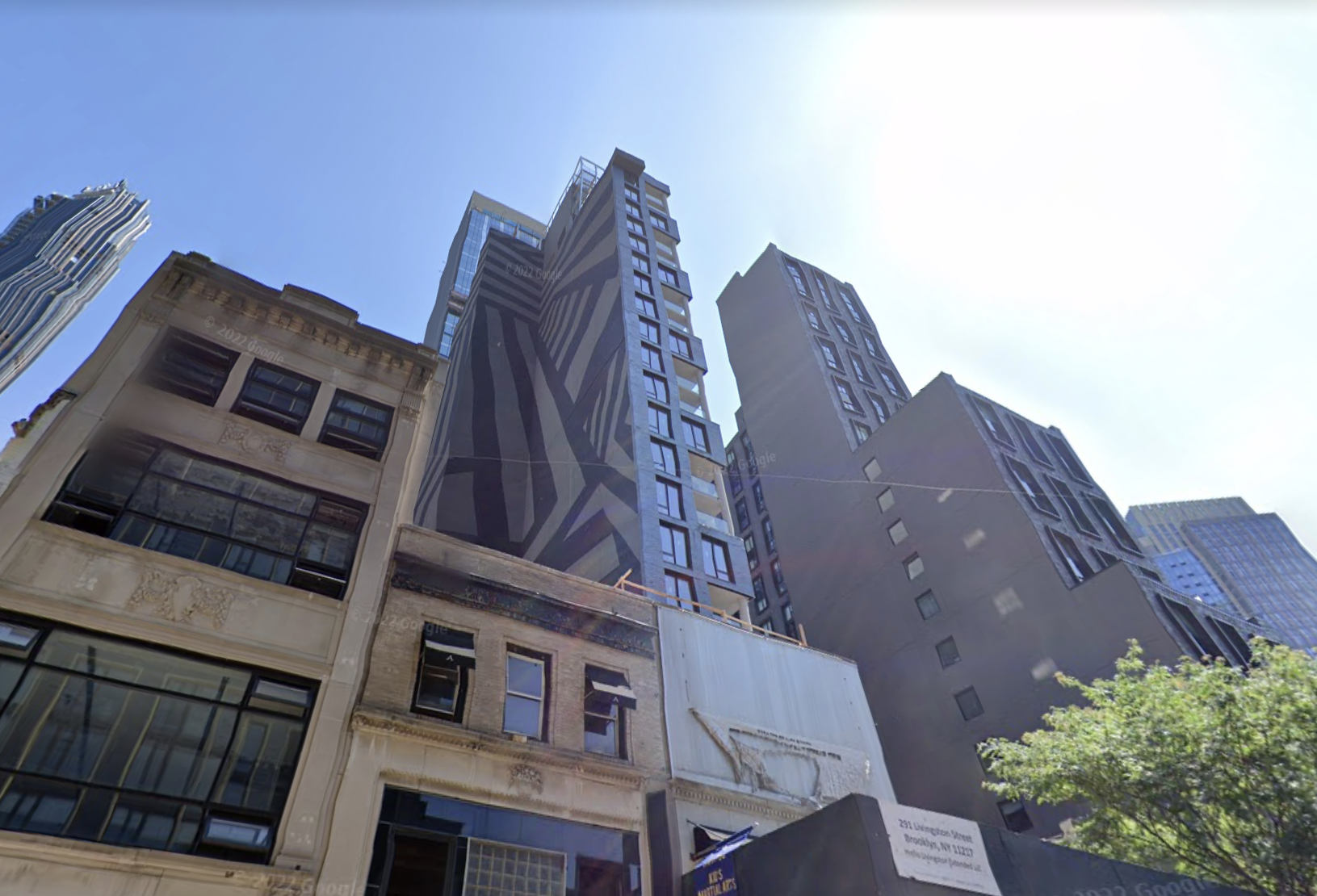 The hotel under construction at 291 Livingston St., Brooklyn, gained notoriety for its black and white mural.