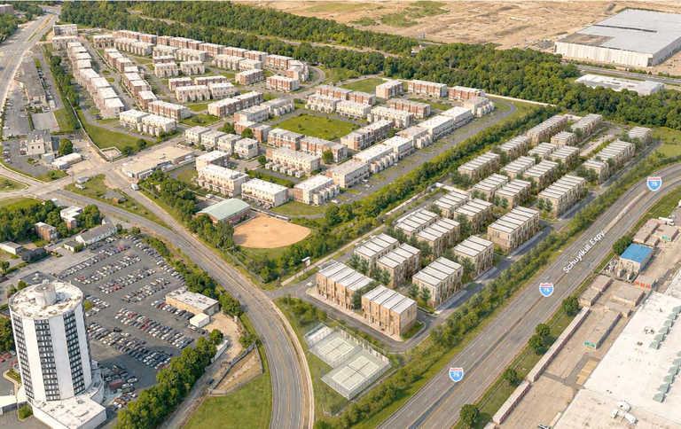 Aerial view of a suburban residential area with rows of apartment buildings, surrounding roads, a baseball field, and a nearby highway.