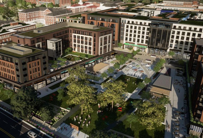 The Parks at Walter Reed central plaza, anchored by Whole Foods