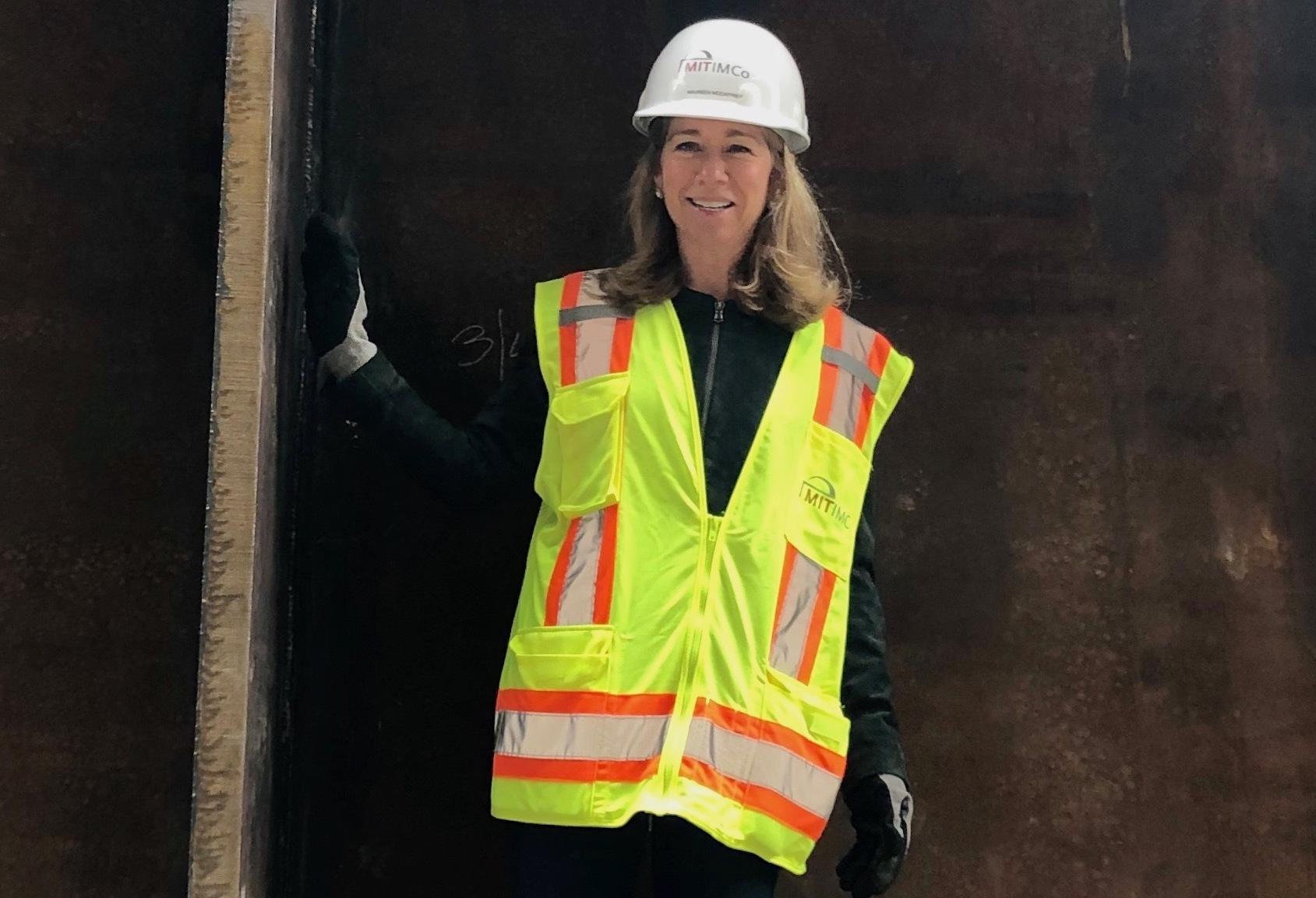 Maureen McCaffrey at the construction site for 238 Main St., which finished construction in 2021 and is home to Bayer, Beam Therapeutics, BlueRock and Lab Central.