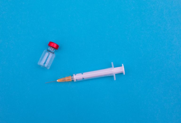 Needle and vaccine vial