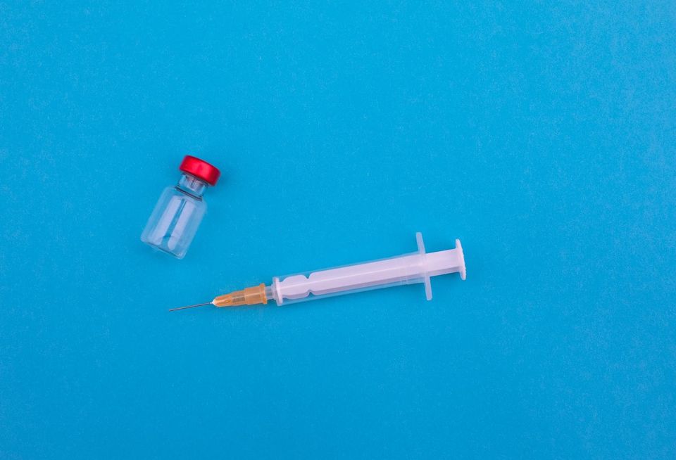 Needle and vaccine vial