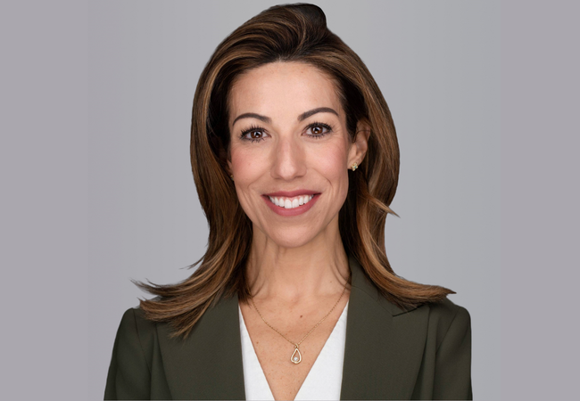 A headshot of Damla Gerhart.