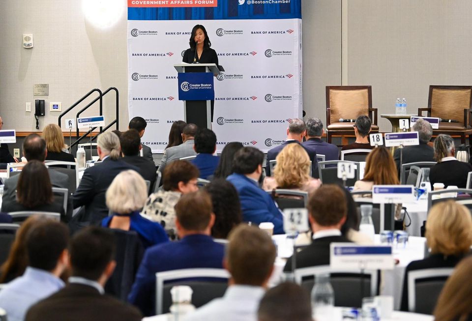 Mayor Michelle Wu addressing a crowd at the Greater Boston Chamber of Commerce's annual event.