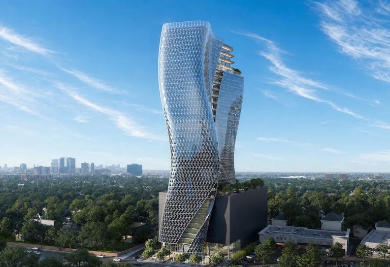 A modern, twisted skyscraper with a glass facade stands against a blue sky, surrounded by greenery and urban buildings in the distance.