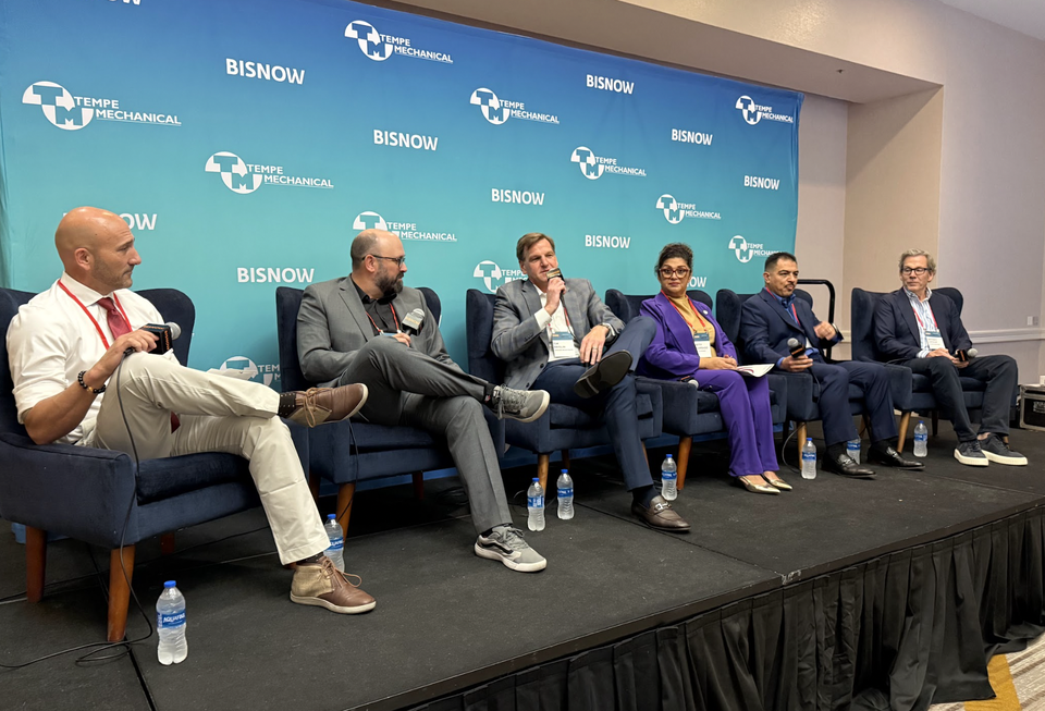 (Left to right) David Box, director for Matrix; Benjamin Ayers, principal for Mancini; Tim Brislin, president for Harvard Investments; Betty Guardado, councilwoman for District 5 in Phoenix; Vicente Ruiz, senior development manager for Trammell Crow Co.; and Jeffrey LaPour, founder and president of LaPour Partners participate in a panel during Bisnow’s Phoenix State of the Market event at the Hyatt Regency Phoenix on Nov. 18.