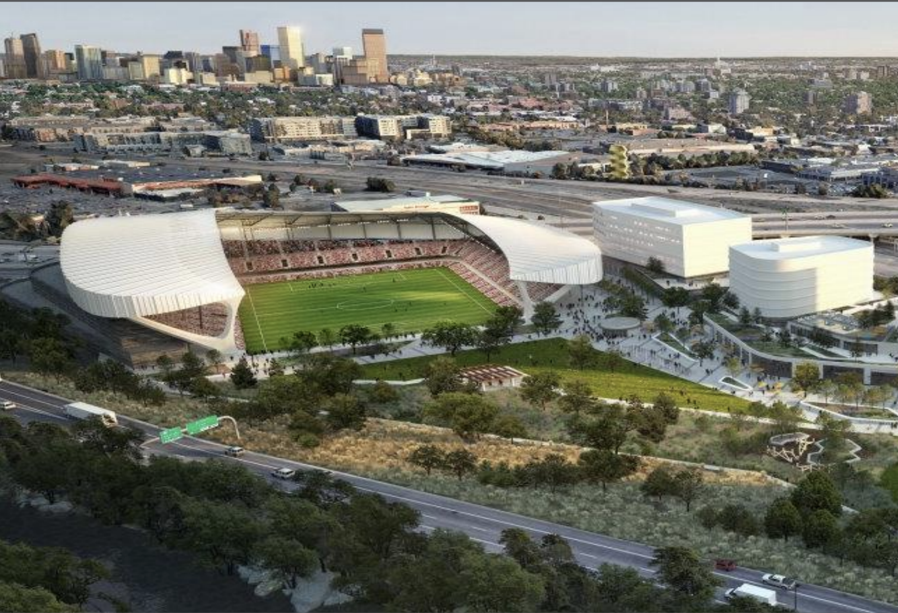A rendering of a soccer stadium and mixed-use buildings in downtown Denver.