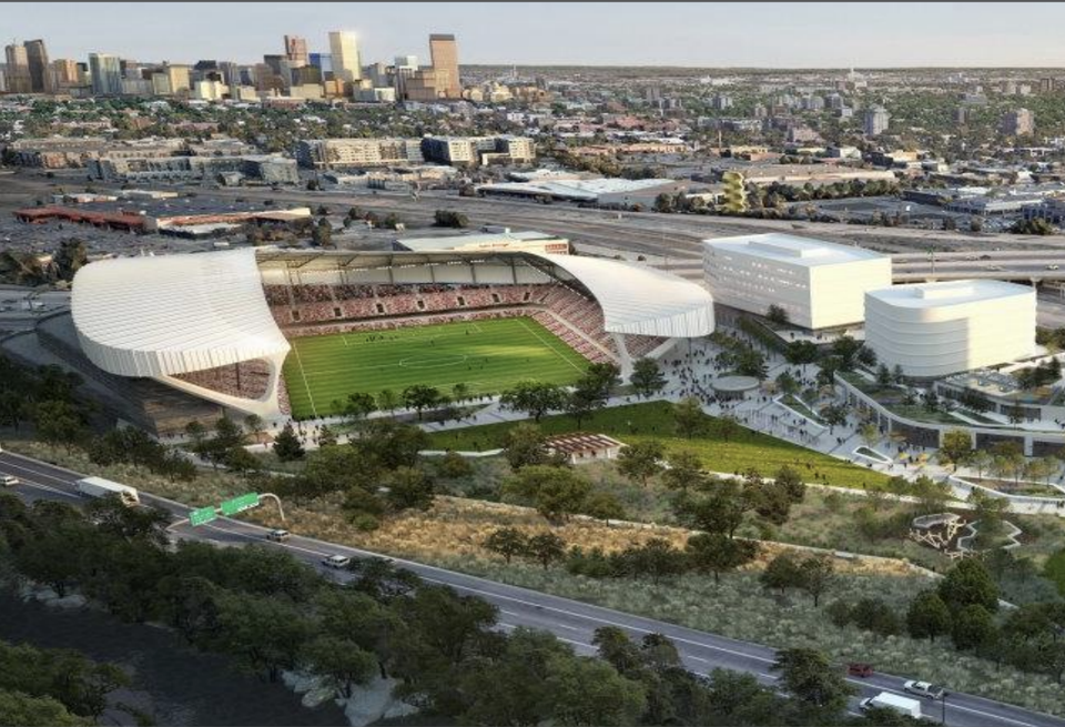 A rendering of a soccer stadium and mixed-use buildings in downtown Denver.