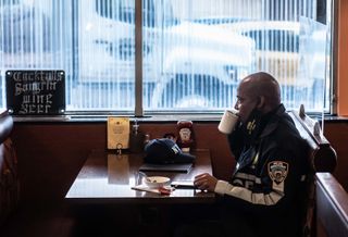 New York City Mayor Eric Adams drinking tea