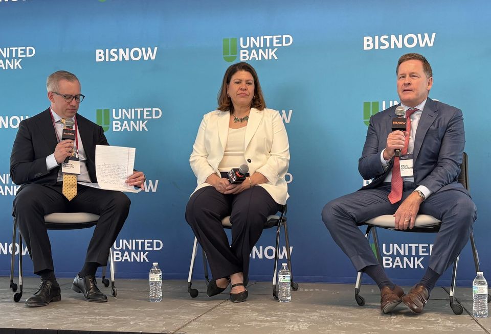 PRP's Paul Dougherty (right) last month at Bisnow's D.C. State of the Market, alongside Deputy Mayor Nina Albert and CohnReznick's Michael Harlow.