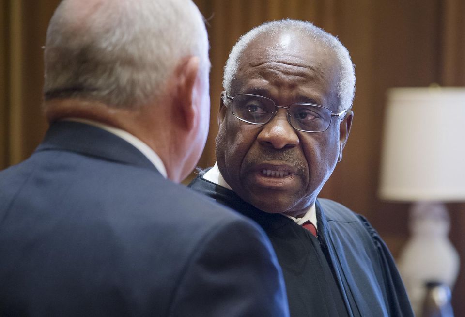 Clarence Thomas, at the 2017 swearing-in of then-Secretary of Agriculture Sonny Perdue, now stands accused of violating federal ethics law for failing to disclose real estate transactions with billionaire Republican donor Harlan Crow.