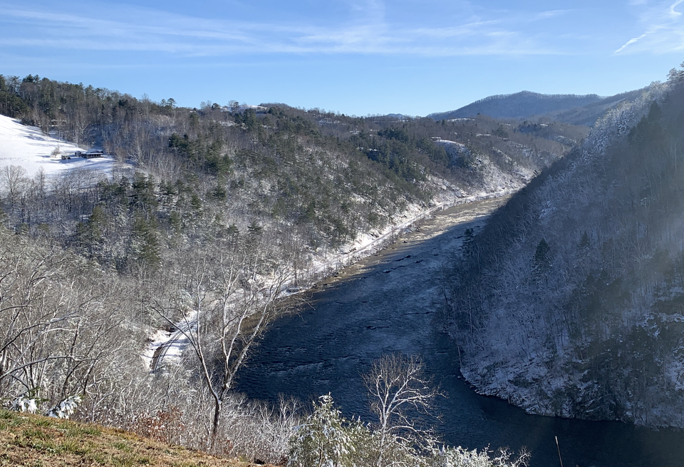 French Broad Crossing in Marshall, North Carolina, on the left bank of the French Broad River, was used as part of a land conservation tax fraud scheme by its developer, Jack Fisher.