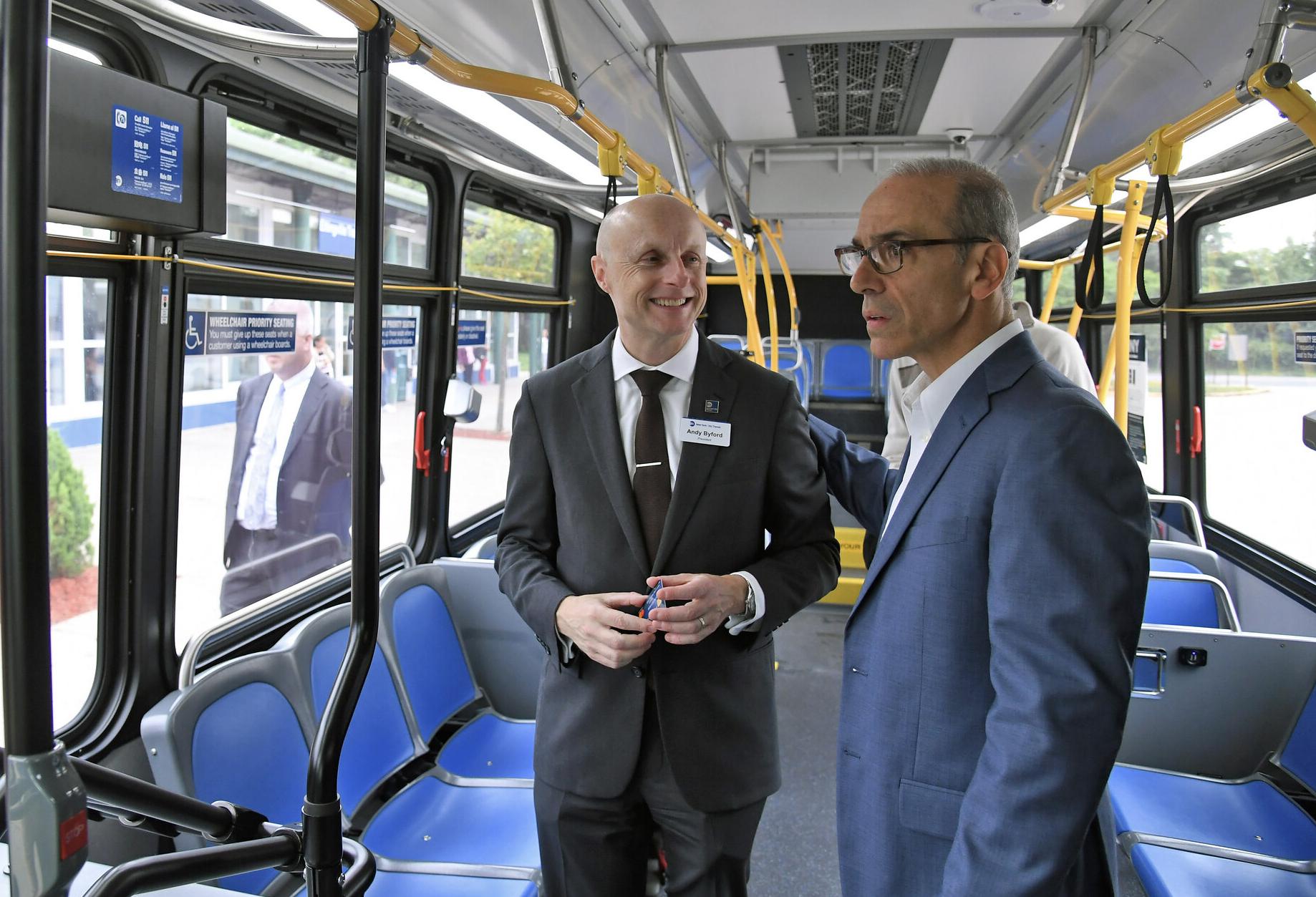 Former NYC Transit Authority President Andy Byford and Jimmy Oddo on board one of several new buses in a fleet being introduced to Staten Island during Oddo's tenure as Borough President.