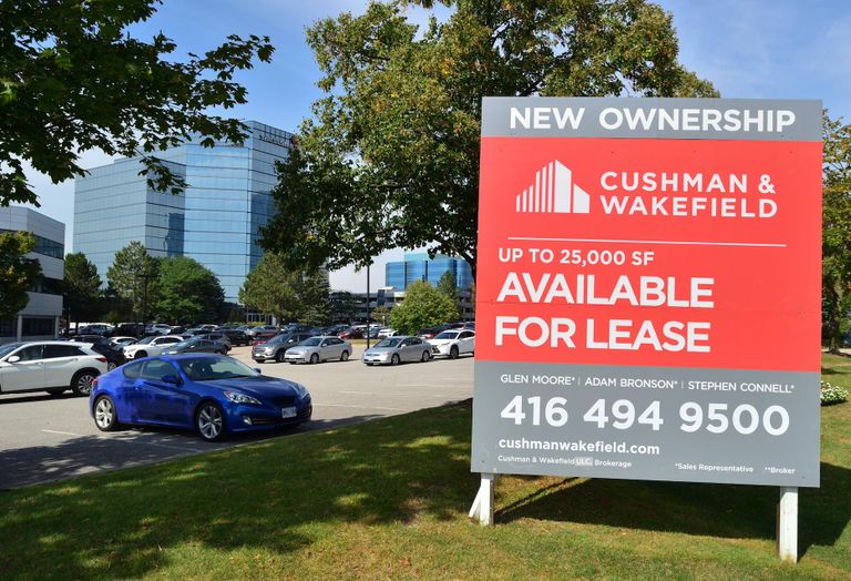 Cushman and Wakefield sign