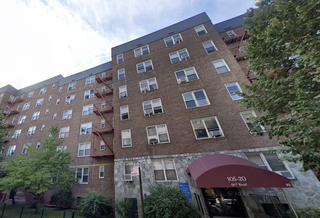 105-20 66th Road, part of the 12-building Forest Hills co-op whose board is struggling with mounting costs, including Local Law 97 fines.