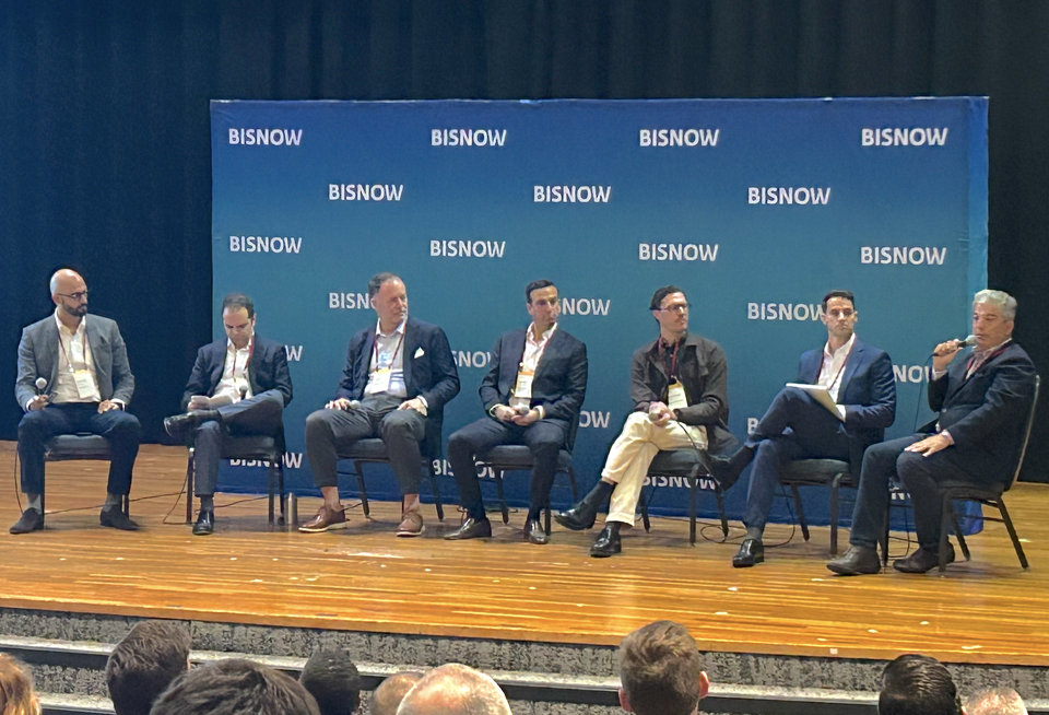 Metro 1’s Andres Nava, Peakhill Equity Partners’ Jonah Belkin, Bank OZK’s Greg Newman, Related Group’s Amro Zakarni, Arquitectonica’s Raymond Fort, SF QOZ Fund’s Liam Krahe and Rosso Development’s Carlos Rosso at Bisnow’s Future of Wynwood, Design District and Midtown event on Jan. 30, 2024.